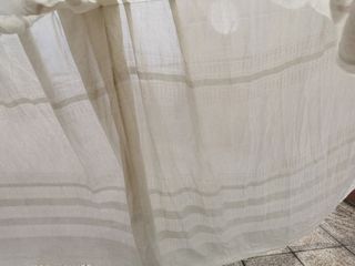 Cortinas vintage en color blanco roto.