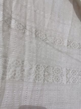 Cortinas vintage en color blanco roto.