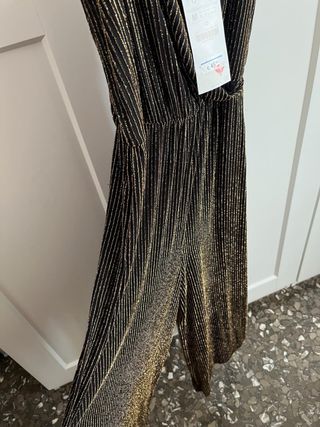 Mono negro y dorado Zara
