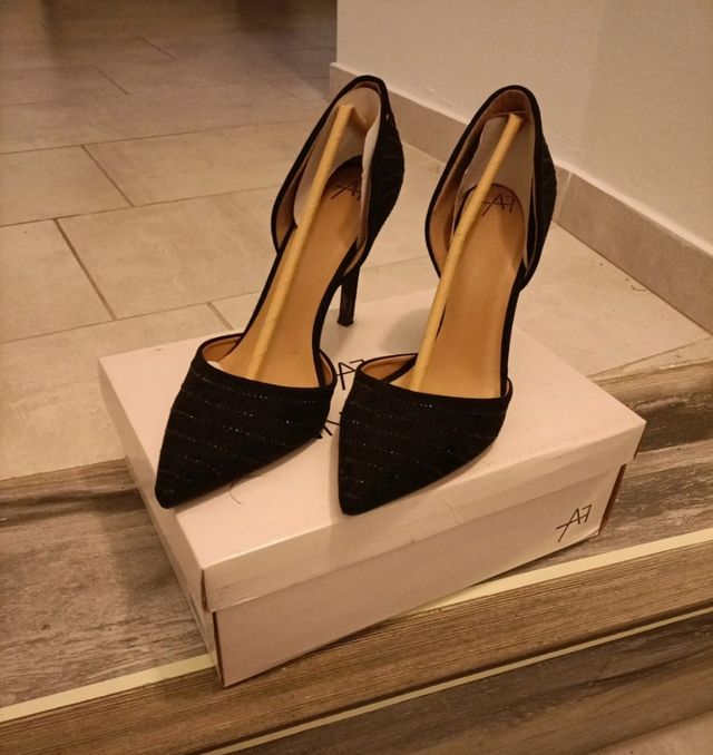 Scarpe eleganti con tacco