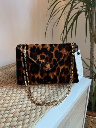 Bolso clutch animal print