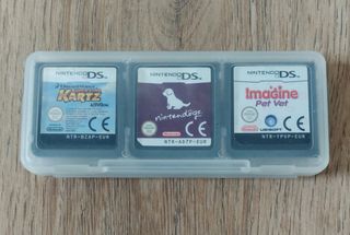 Lotto 3 giochi Nintendo DS + scatola porta schede