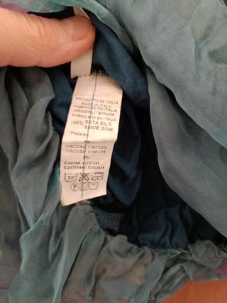 Top elegante monospalla