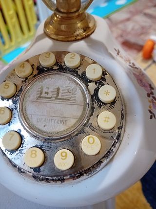 Telefono vintage ceramico oro-bianco