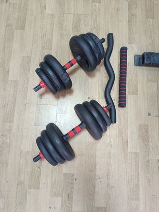 Pareja de mancuernas con accesorios.