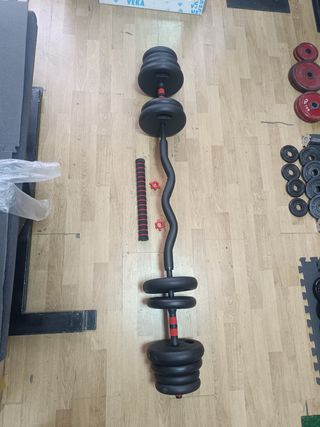 Pareja de mancuernas con accesorios.