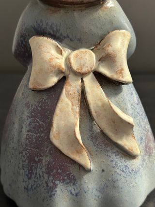 Figura niña de barro y ceramica