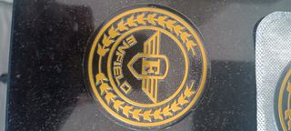 Emblemas depósito, parche y braga cuello.
