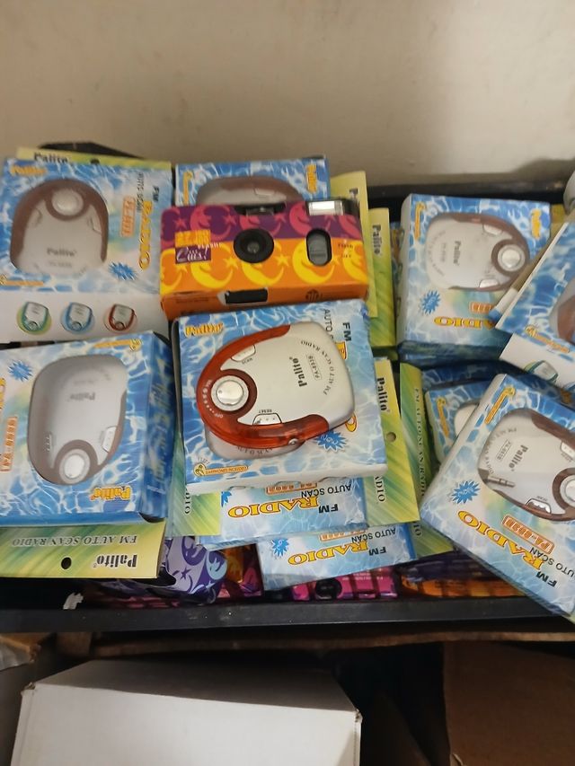 Vendesi radio cuffie portatile più macchina fotogr