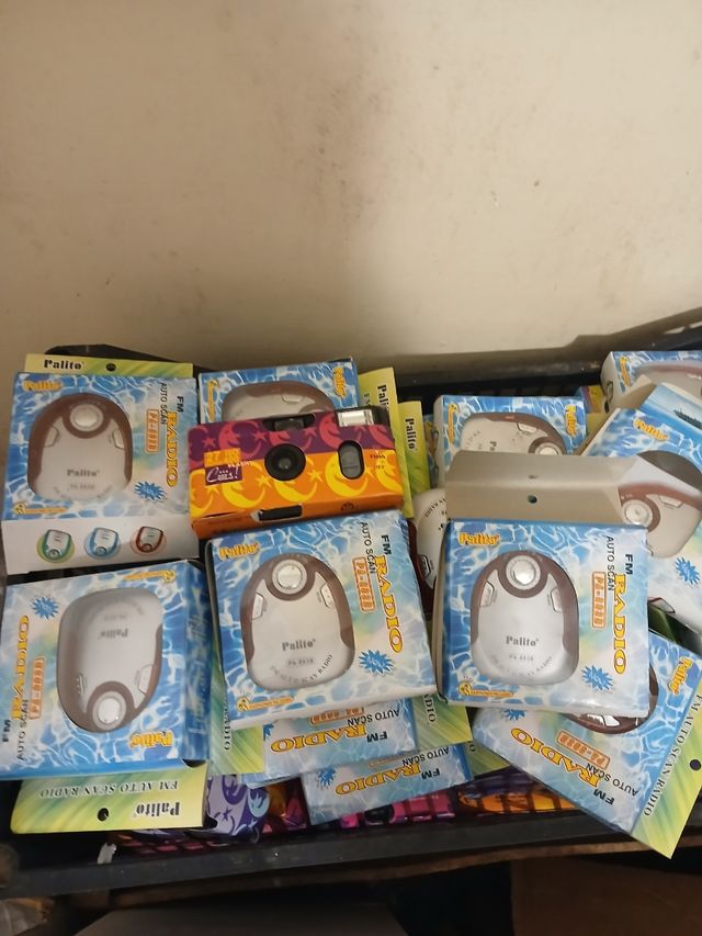 Vendesi radio cuffie portatile più macchina fotogr