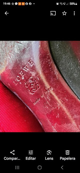 Botas Loewe de piel y colgante logotipo