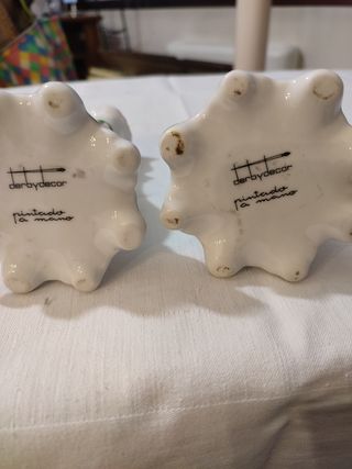 Pareja de candelabros cerámicos rosa-blanco