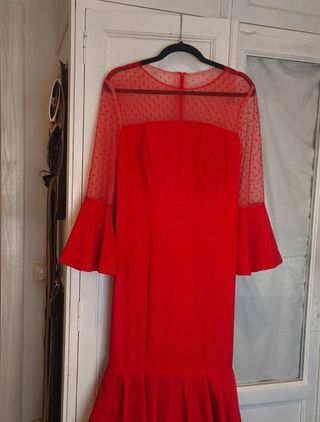 Traje de flamenca rojo con plumeti 