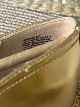 Alpargatas planas doradas