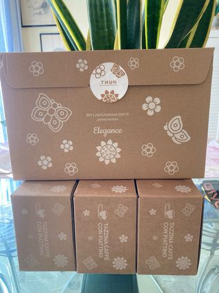 4 scatole vuote Thun