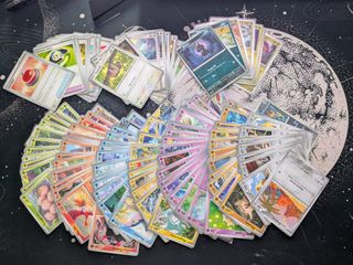 117 Cartas Pokémon Surging Sparks