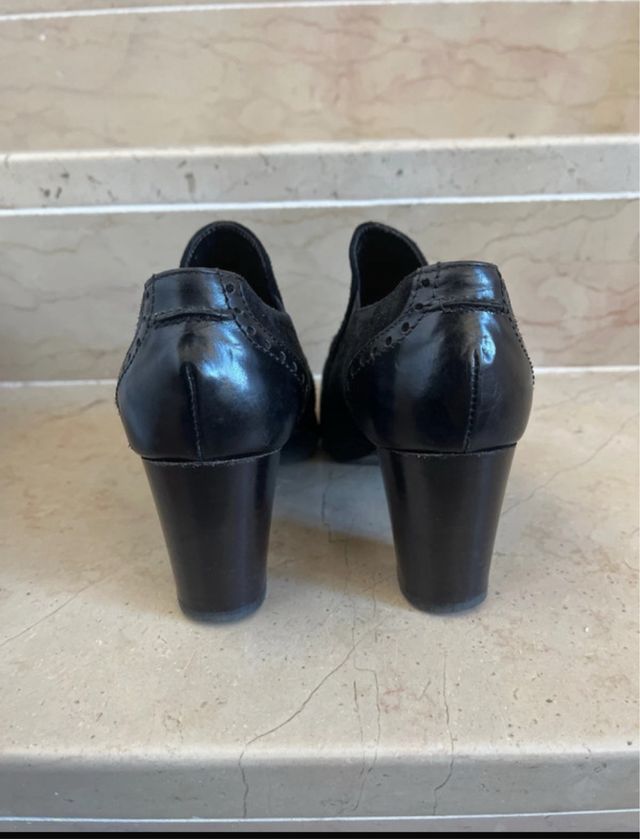 Scarpe loafer nere con tacco