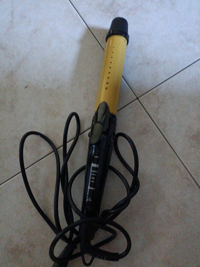 Arricciacapelli con doppia funzione