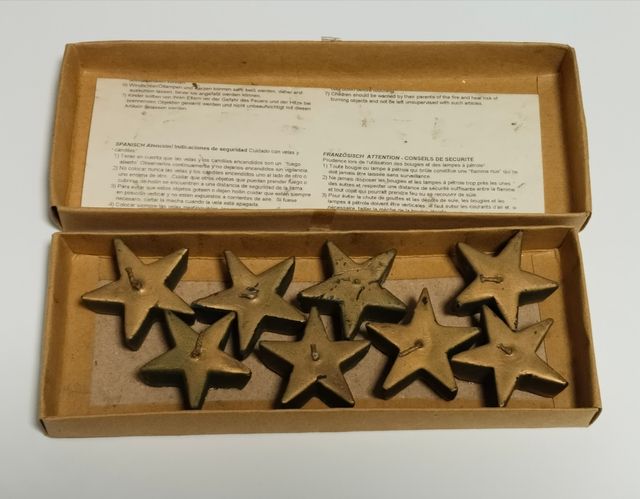 Candele galleggianti a forma di stella dorata - 8 pezzi