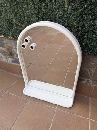 Espejo de arco con estante
