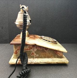 Teléfono de ónix y oro 18k