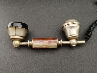 Teléfono de ónix y oro 18k