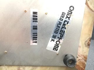 Teléfono de ónix y oro 18k