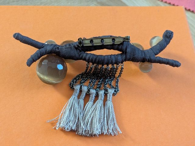 Broche Hoss Intropia marrón y gris, ojo de tigre