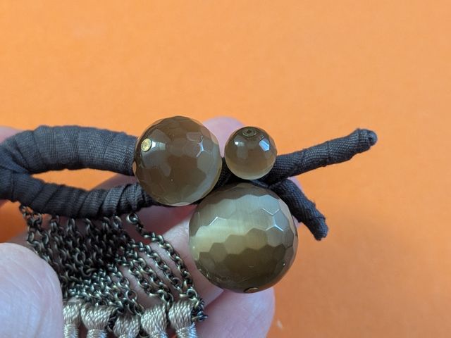 Broche Hoss Intropia marrón y gris, ojo de tigre