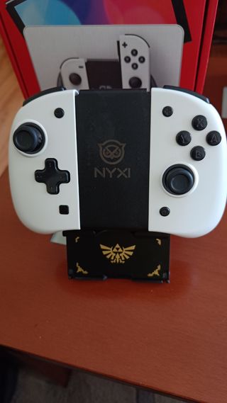 Nintendo Switch OLED + 2 mandos + juego y más..