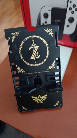 Nintendo Switch OLED + 2 mandos + juego y más..