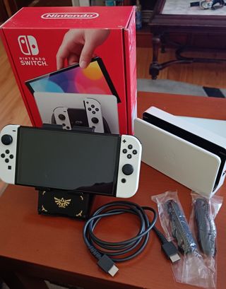 Nintendo Switch OLED + 2 mandos + juego y más..