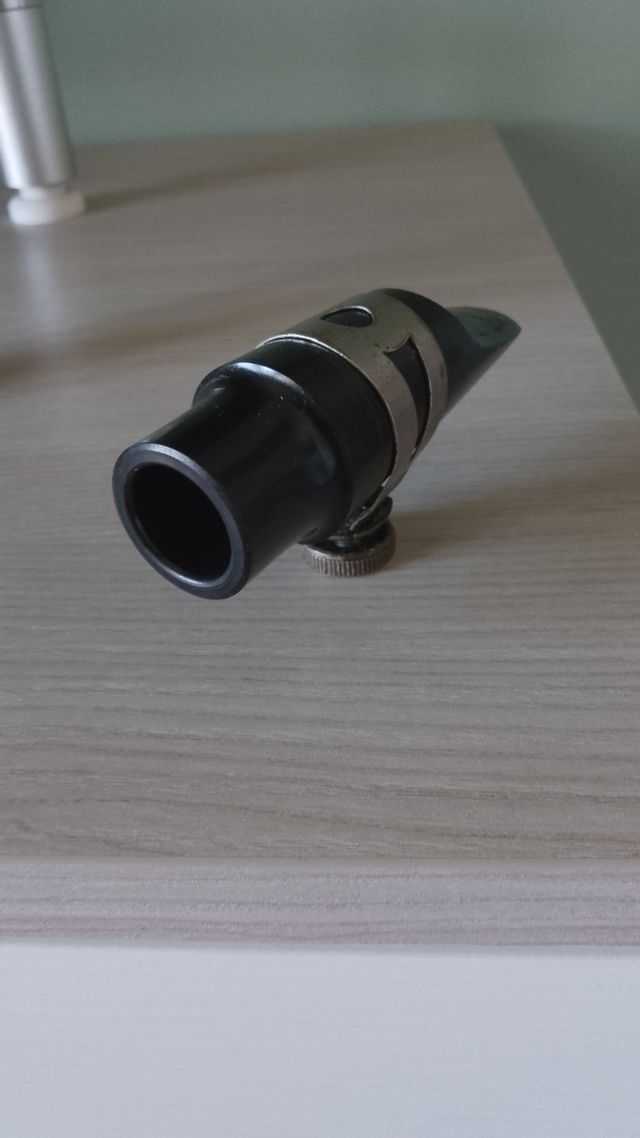 Abrazadera boquillas de ebonita para saxo alto