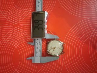 Reloj Sonix dorado vintage