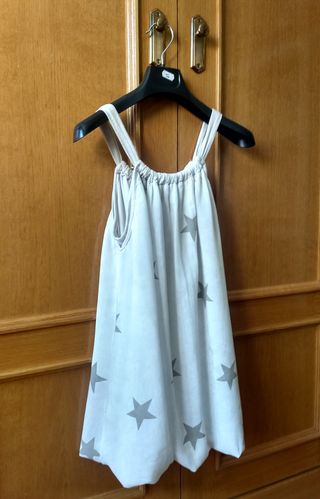 Top beige con estrellas