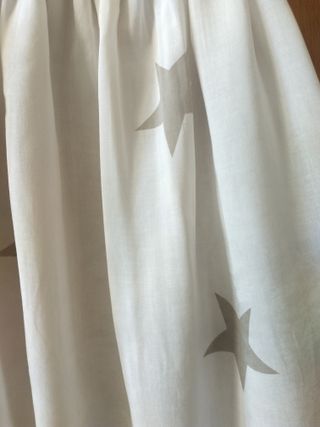 Top beige con estrellas