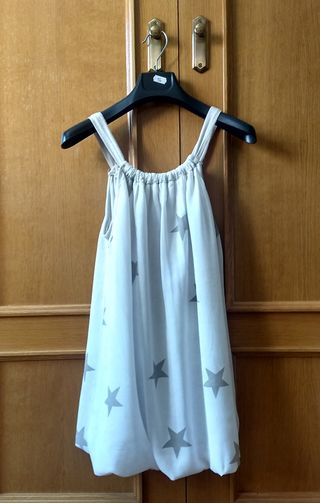 Top beige con estrellas