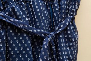 Blusa con escote cruzado tipo peplum de Cortefiel