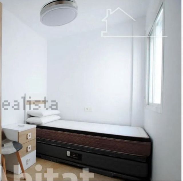 Cama singola con dos colchones