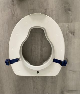 Asiento elevador WC