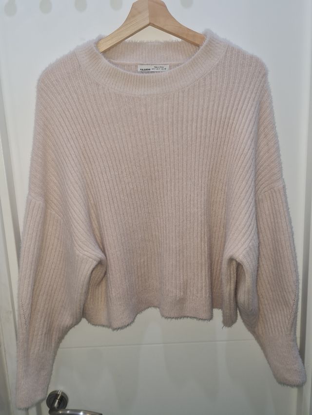 Suéter redondo mujer