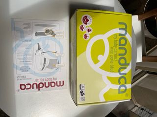 Manduca portabebés + regalo pañales de tela nuevos