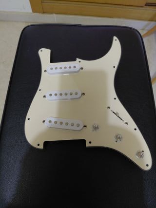 Golpeador guitarra electrica