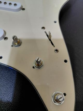 Golpeador guitarra electrica