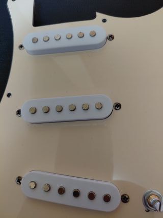 Golpeador guitarra electrica