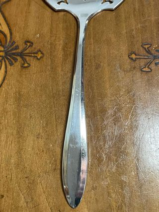 Cucchiaio forato in metallo argentato art nouveau