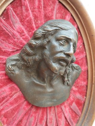 Antico mezzobusto in bronzo Gesù in altorilievo