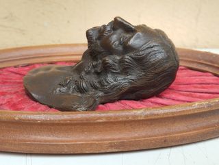 Antico mezzobusto in bronzo Gesù in altorilievo