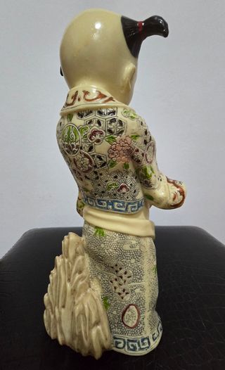 Figura un niño con un perro de resina