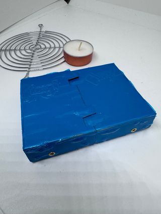 Parrilla portátil plegable para velas